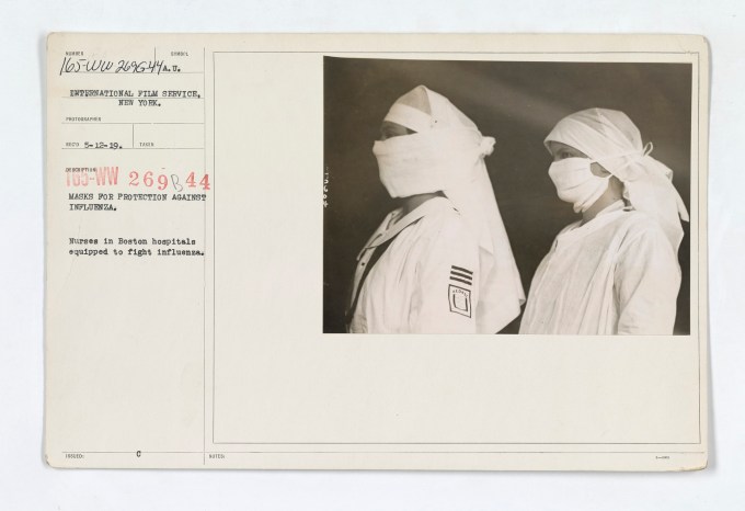 Medical_Department_-_Influenza_Epidemic_1918_-_Masks_for_protection_against_influenza._Nurses_in_Boston_hospitals_equipped_to_fight_influenza_-_NARA_-_45499377